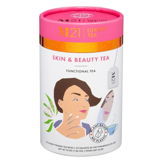 M21 Skin & Beauty Tea packaging with pink lid and white body featuring a woman's face and tea bag illustration.